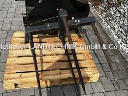 Fliegl Rundballenabwickler und Transport