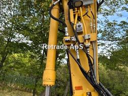 Komatsu PW148 – 10  med vogn