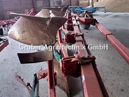 Kverneland PG-100 8-schar mit Tigges Packer